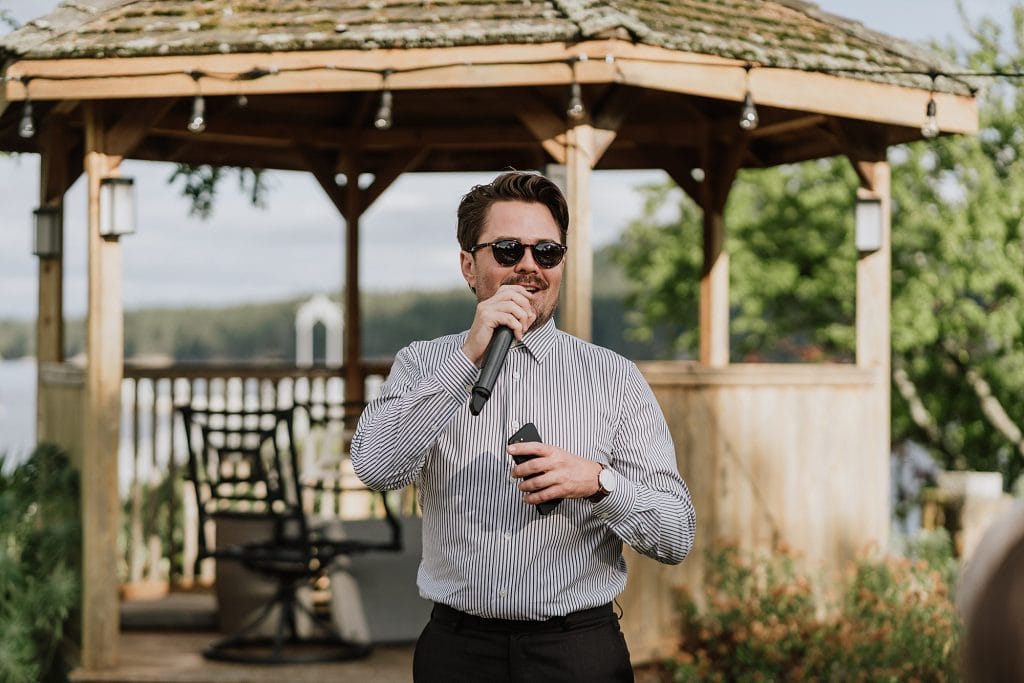 A man holding a microphone and singing.