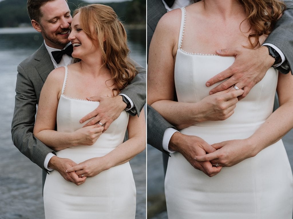 A couple dressed in wedding attire stands by the water, smiling and embracing, with a close-up showing their hands and wedding rings.